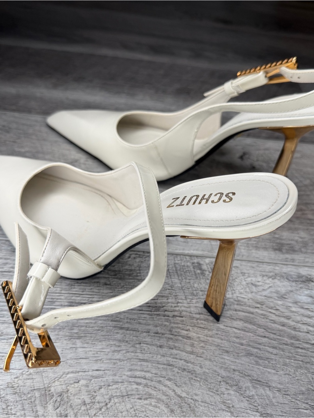 SCHUTZ White Pointed Slingback Heels with Gold Chain Accent